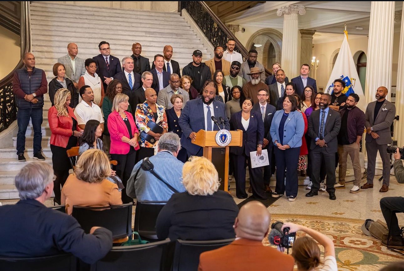 Chris Worrell speaking at the State House podium